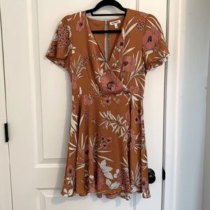 Never been worn, gold floral dress.